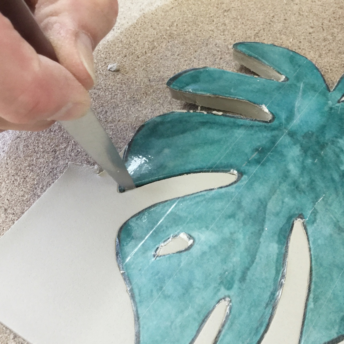 Cut the leaf out of the clay